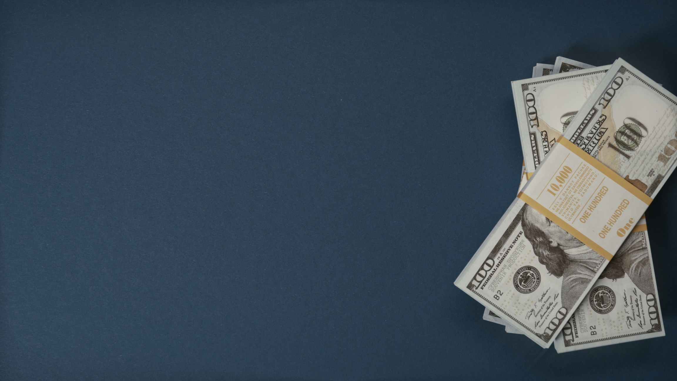 Dollars on Blue Surface
